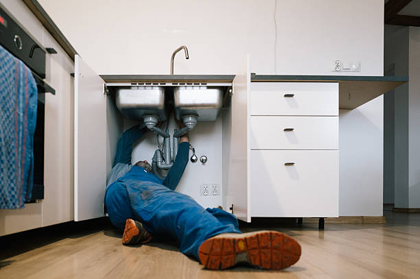 Professional Drain Cleaning technician working in Dakota, IL